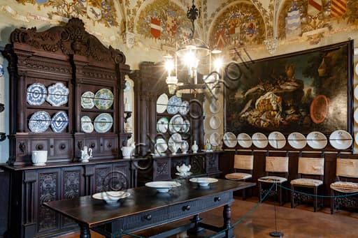 Interior of the historic kitchen with fireplace and furnishings in the Rocca Sanvitale of Fontanellato