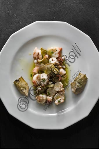 Image of a plate of Italian octopus salad with artichokes, a traditional Puglian recipe