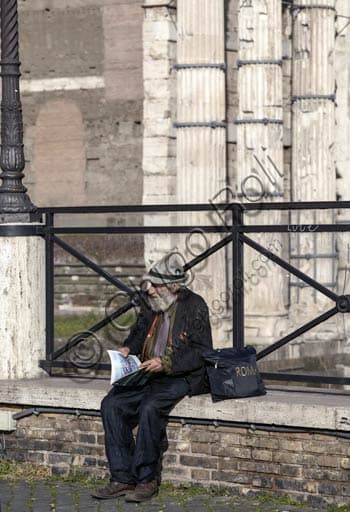 Architectural view of Trajan's Market in Rome with a traveller figure in the Roman Forum