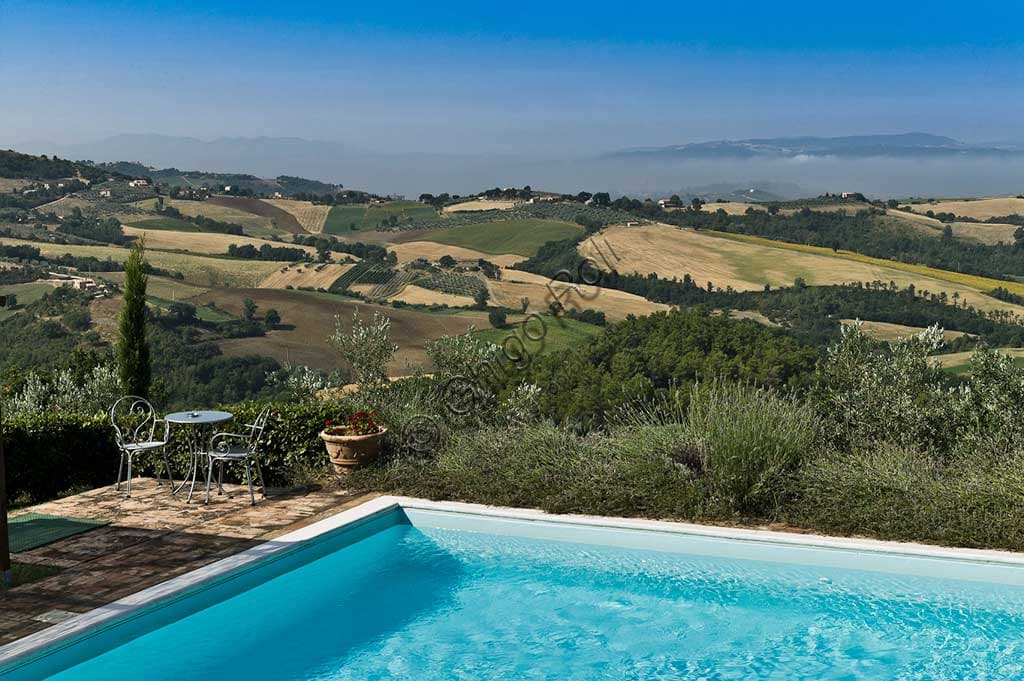 Outdoor swimming pool at La Ghirlanda agriturismo set in the Tuscan countryside
