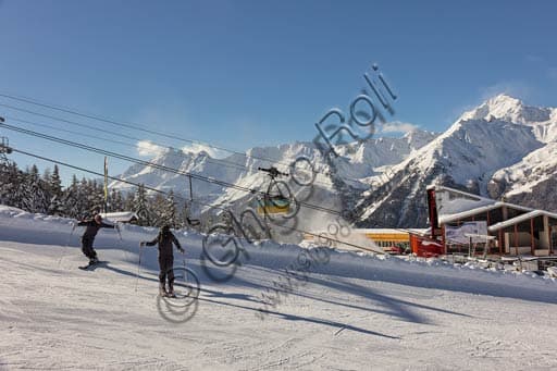 Aerial view of the Bormio 2000 ski slopes and ski lift network in the Italian Alps