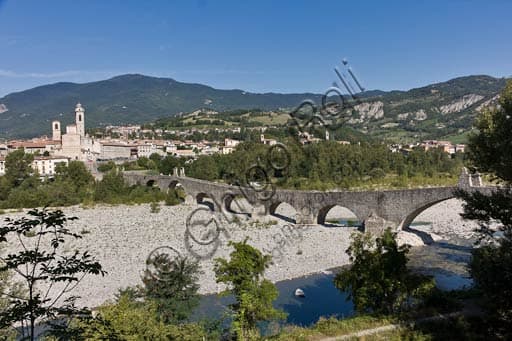 View of Ponte Vecchio (Old Bridge) in Bobbio, known as the Hunchback or Devil's Bridge, crossing the Trebbia river with eleven arches