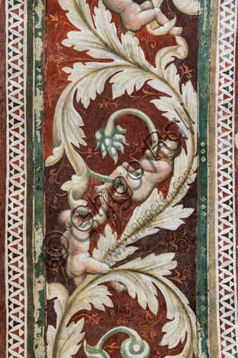 Detail of fresco in the Painted Room, Rocca Albornoz Spoleto: floral festoon and puttos in 14th-century courtly style.