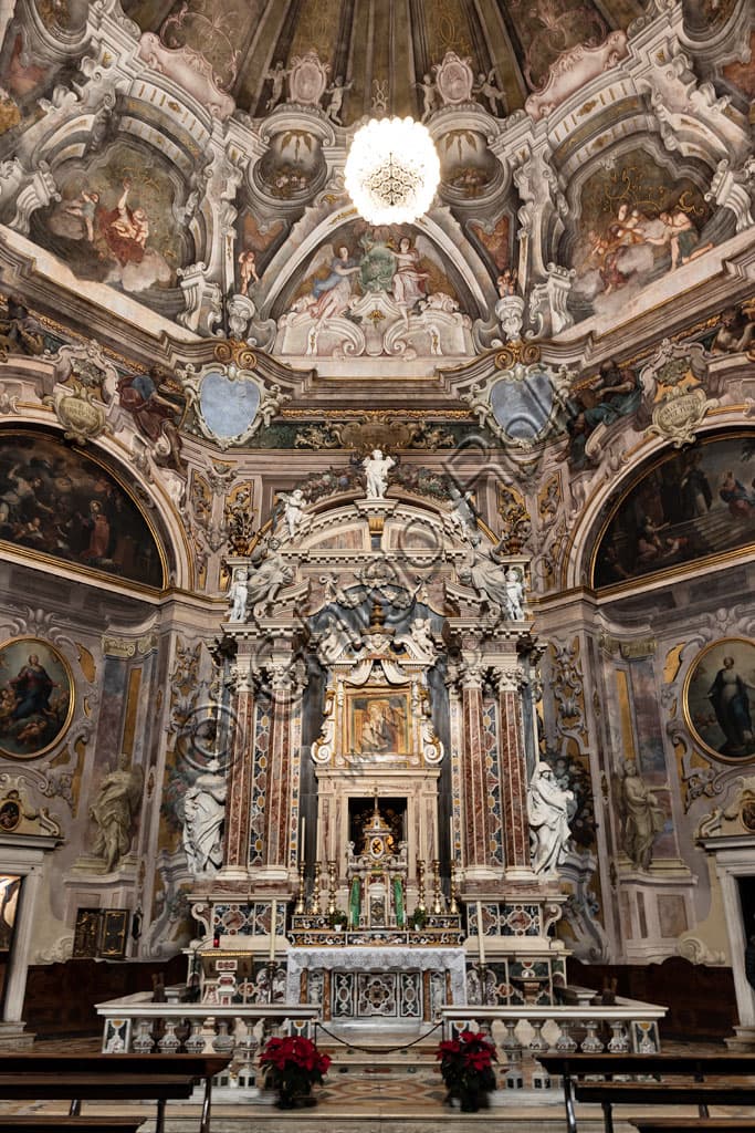 Interior view of the Church of Santa Maria della Carità in Brescia, showcasing the Baroque major altar and octagonal layout