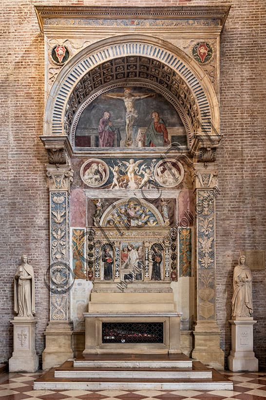 Sculptural detail of the Poiana Altar: Christ held by Saint Francis and Saint Bernardino of Siena, St. Lawrence Church, Vicenza, Italy