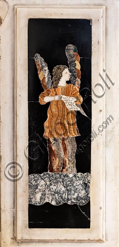 Detail of music angel with sheet, Baroque main altar of St. Corona Church in Vicenza