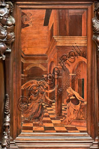 Wood intarsia The Annunciation by Gian Michele De' Pantaleoni, St. Lawrence Cathedral Genoa, presbytery apse choir south side