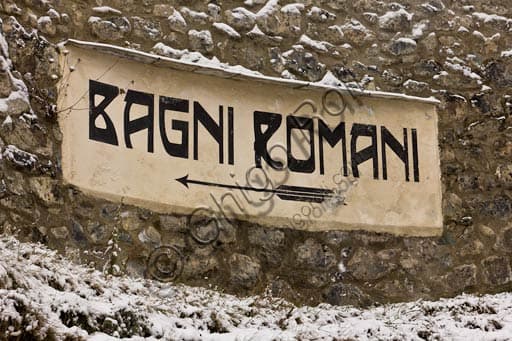 Sign reading 'Roman Baths' at the Bagni Vecchi thermal baths in Bormio, Italy