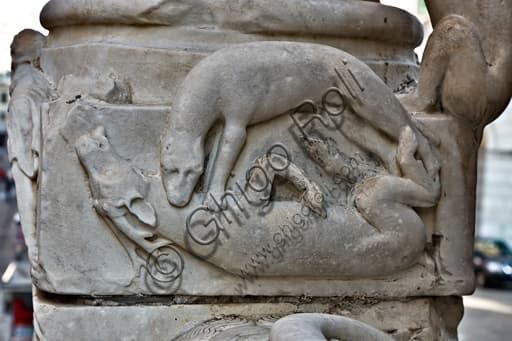 Sculptural detail of a column base with dog attacking a deer, Genoa St. Lawrence Cathedral façade