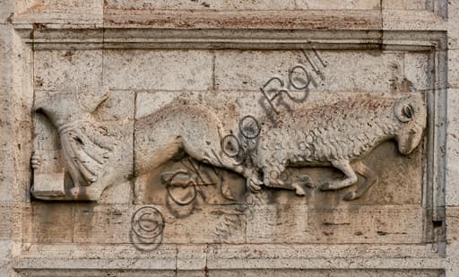 Detail of Romanesque bas-relief depicting the fable of the student wolf and the ram, St. Peter's Church Spoleto Italy