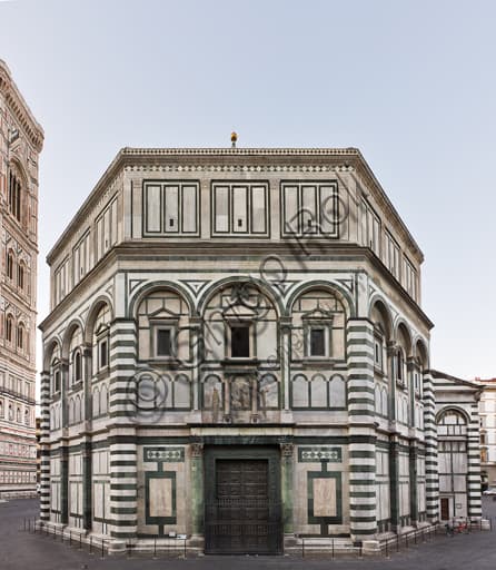 North façade of the Baptistery of Saint John in Florence with white and green marble and Lorenzo Ghiberti's door