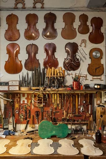 Luthier tools and soundboard models in Stefano Conia's workshop in Cremona
