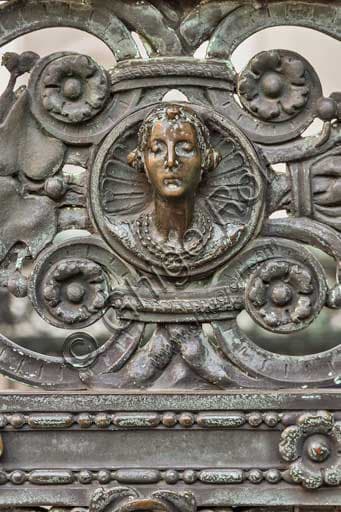 Detail of a woman's head on the wrought iron gate by Vincenzo Muzio, Colleoni Chapel Bergamo