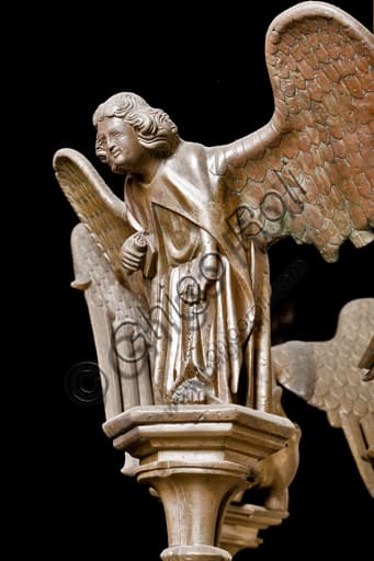 Detail of St. Matthew's symbol, brass candlestick in Genoa Cathedral, Dinant manufacture 15th century