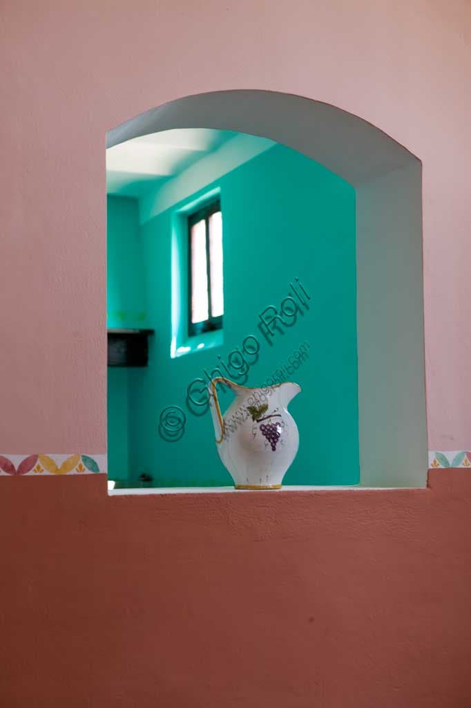 Industrial architecture of the Scacciadiavoli Winery in Cantinone locality, Montefalco, featuring historic jug and window detail