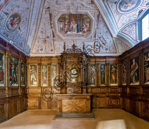 Interior of the Chapel of the Relics in Spoleto Cathedral showing the wood altar and cupboards by Giovanni Andrea di Ser Moscato