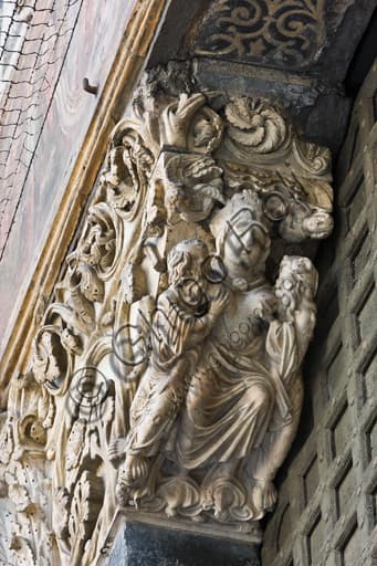 Sculpture of Ecclesia feeding Peter and Paul, corbel on Genoa Cathedral main doorway, by Master of the Ark of the Baptist c. 1225