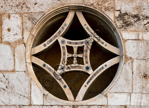 Detail of Cosmatesque decorations on a Romanesque oculus, St. Peter's Church Spoleto façade