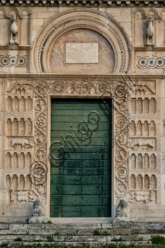 Detail Romanesque portal sculptures St Peter's Church Spoleto eagles deer