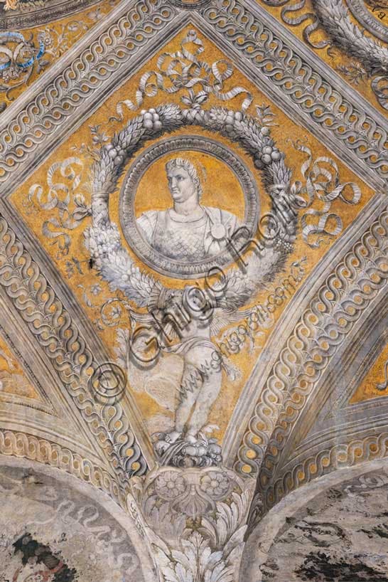 Detail of the Camera Picta vault fresco: golden lozenge with Nero portrait and putto, Mantegna, Ducal Palace Mantua