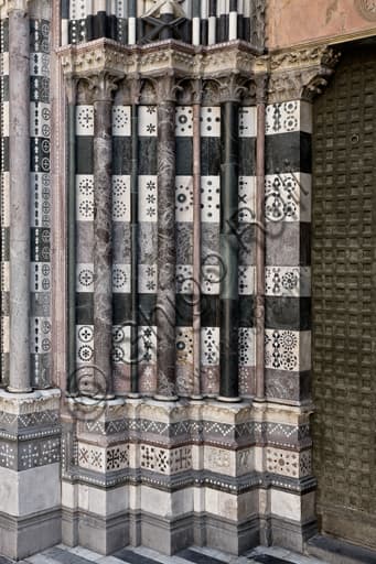 Bases and columns of the left doorway, Saint Lawrence Cathedral, Genoa Italy