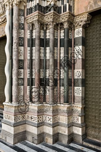 Bases and columns of the right doorway, west façade of St. Lawrence Cathedral in Genoa, Italy