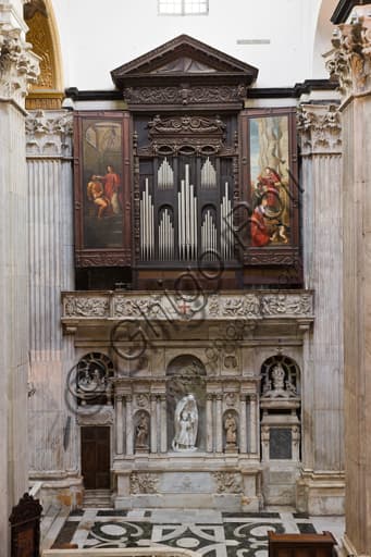 Interior of Genoa Cathedral, southern transept with Renaissance organ and Baroque St. Joseph altar