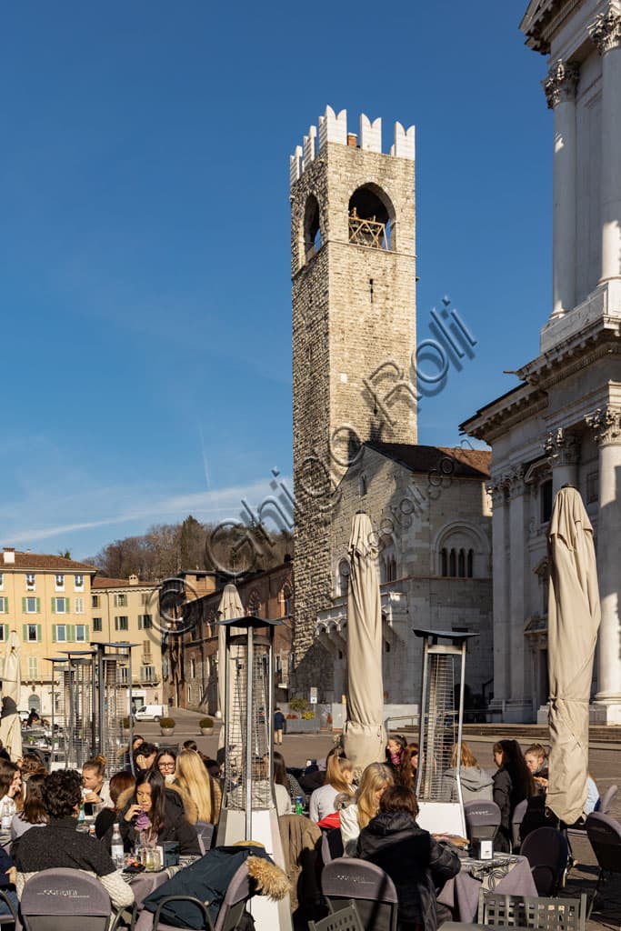 View of Paolo VI Square in Brescia with the New Cathedral, the Broletto, the Pégol Tower and the Loggia delle Grida
