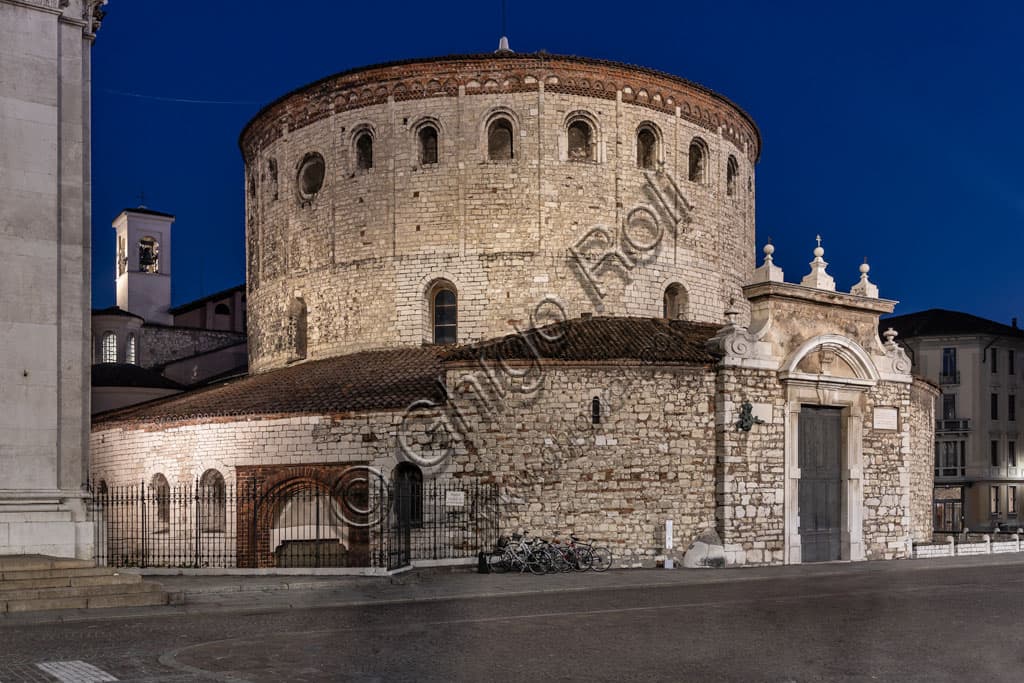 Old Cathedral of Brescia (Duomo Vecchio), night view in Paolo VI Square, 11th century Romanesque architecture, Winter Cathedral