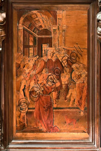 The Charity of St Lawrence, detail of the Renaissance wood intarsia panel in the choir of Genoa Cathedral