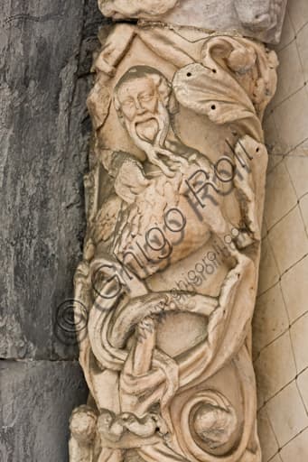 Monstrous figure sculpture in the lunette of the St. Gotthard Doorway, St. Lawrence Cathedral, Genoa