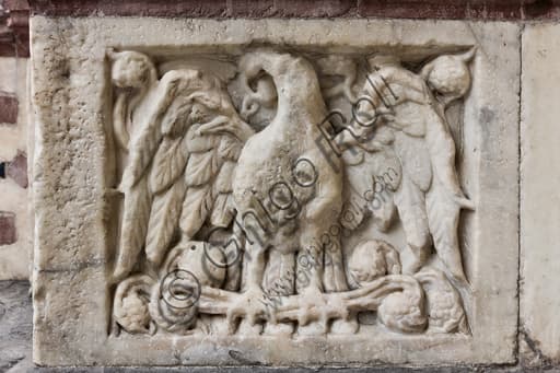 Sculptural panel eagle with spread wings, detail of doorway St. Lawrence Cathedral Genoa