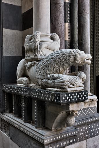 Detail of column base lions and Eagle of St John the Evangelist sculpture Genoa Cathedral Antelami workshop