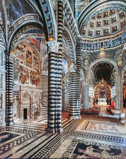 Interior of Siena Cathedral from the south-west, showing the façade of the Piccolomini Library in the left aisle