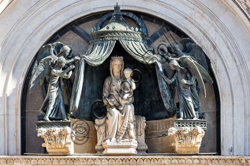 Sculpture of Madonna and Child with angels in the lunette of Orvieto Cathedral, Italy, 14th-century art.