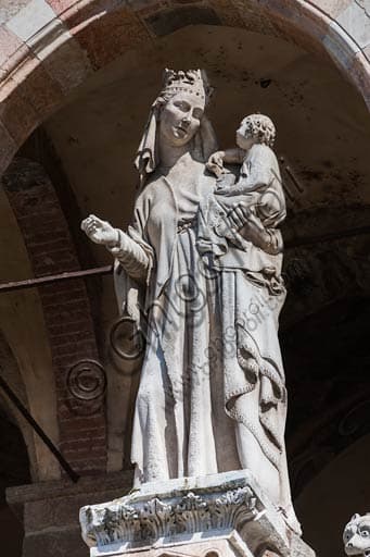Madonna and Child statue on the loggia of Cremona Cathedral facade