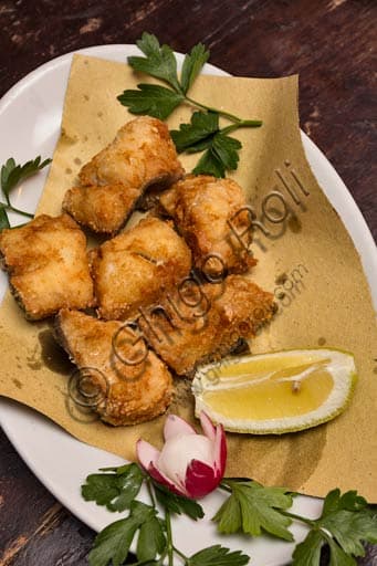 Typical Piacenza fried cod, speciality of Osteria La Carrozza