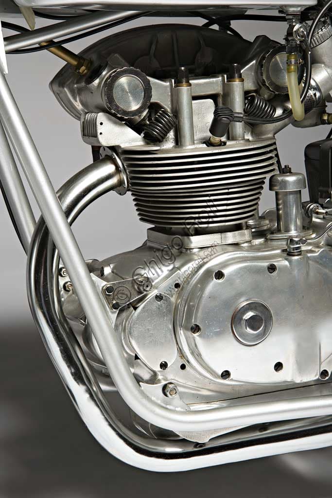 Photograph of the restored Mondial 175 classic motorcycle, 1954 model, side view showing the single-cylinder engine and frame.
