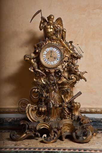 19th century golden bronze table clock, sculpture of Cronus with scythe, Yellow Room Royal Palace Palermo