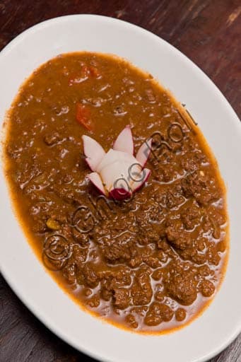 Dish of Piccola, horse meat stew speciality at Oster ia La Carrozza restaurant in Piacenza