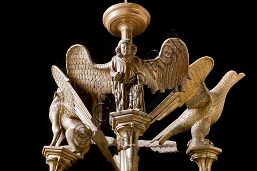 Detail of the brass candlestick with symbols of the Evangelists, St. Lawrence Cathedral Genoa