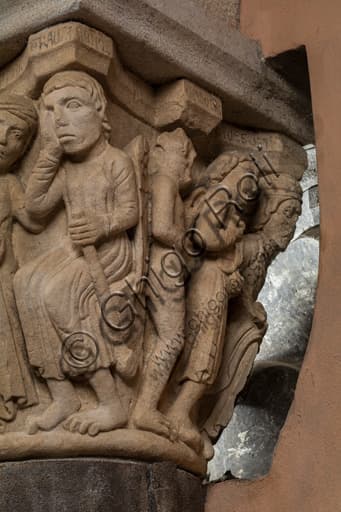Sculpture detail Capital of the Judge Ghirlandina Tower Modena: corrupt judge with chain and Lucifer, Romanesque Campionesi art