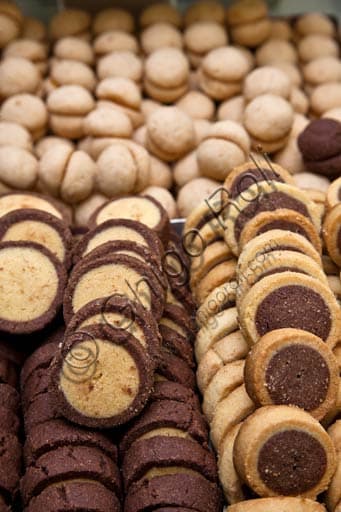 Historic interior of Lanfranchi Pastry Shop in Cremona with a display of artisanal cookies