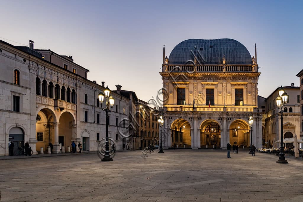 Night view of Piazza della Loggia in Brescia with the illuminated Palazzo della Loggia, Renaissance Venetian architecture by Luigi Vanvitelli