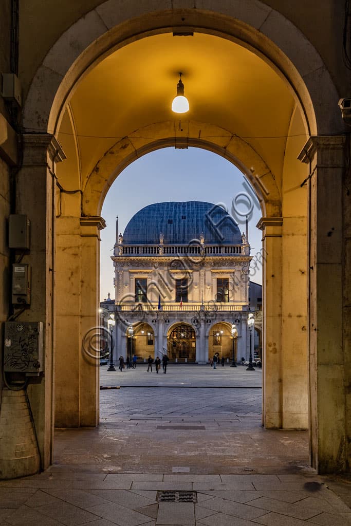 Night view of Piazza della Loggia in Brescia from Beccaria street, with the Palazzo della Loggia in the background