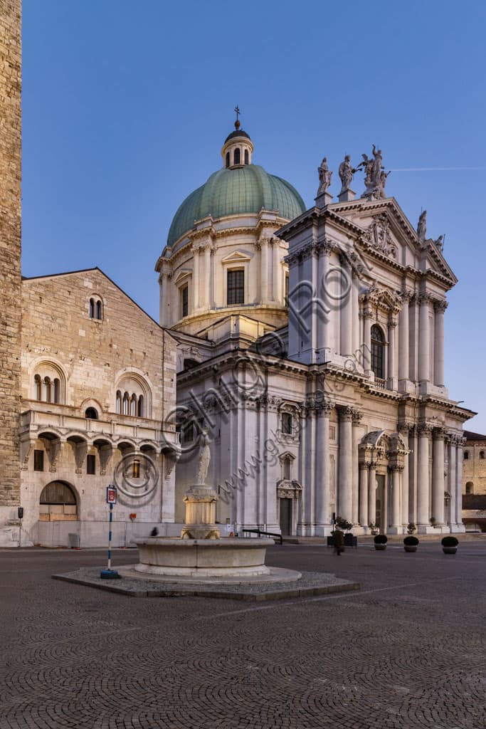 Panoramic view of Paolo VI Square in Brescia Italy showing the Broletto, Baroque New Cathedral and Old Cathedral