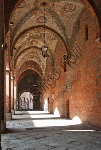 Photo of the internal porch architecture at the Palazzo del Comune in Cremona, medieval loggia in the historic center