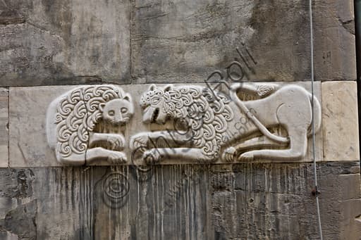 Romanesque sculptural relief with two lions facing each other, south side of St. Lawrence Cathedral in Genoa