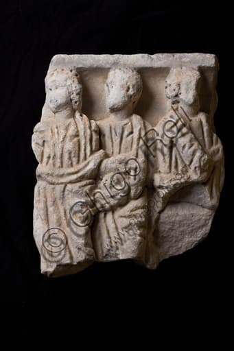 Ancient Roman stone relief sculpture showing figures wearing togas, Museum of Ligurian Archaeology, Genoa