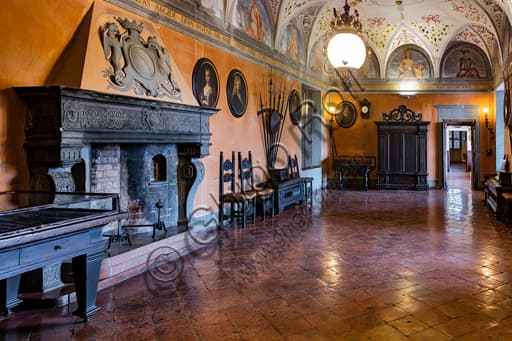 Interior of the Weapons Hall with collection of armor and ancient weapons in Rocca Sanvitale Castle, Fontanellato, Parma